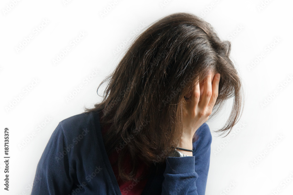 girl covers her face, desperate woman on white background girl covers her face, desperate woman on white background