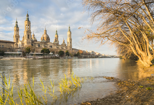 The Cathedral-Basilica of Our Lady of the Pillar in Zaragoza on the Ebro River at the dawn, Spain.