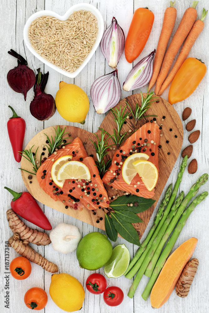 Healthy heart superfood concept with fresh salmon fish, fruit