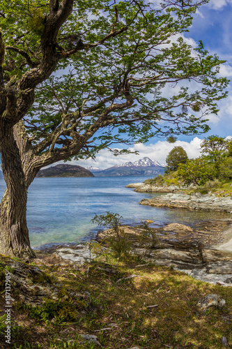 Scenic snow capped Chilean mountains seen from Tierra del Fuego National Park in Argentina.