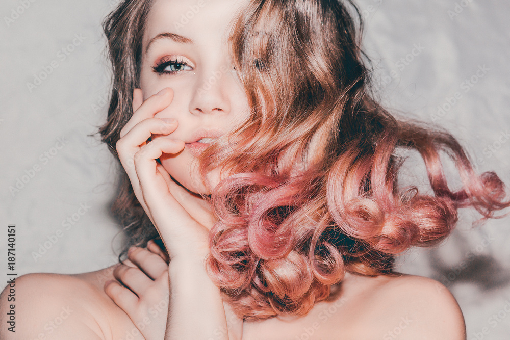 Fototapeta premium Blonde girl with curly hair/advertising 