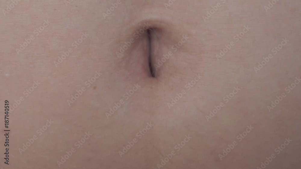 Female Navel Moving at Laughing. Extreme Close Up Female Navel Moving at Laughing. Extreme Close Up