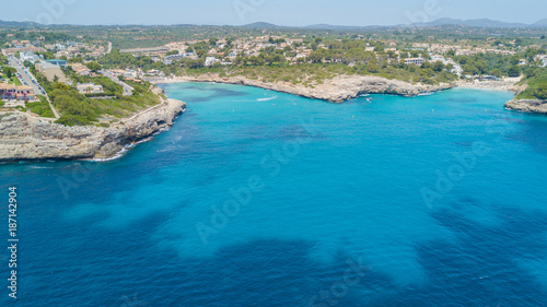 Drone aerial landscape of the beautiful bay of Cala Mandia and Anguila with a wonderful turquoise sea, Porto Cristo, Majorca, Spain