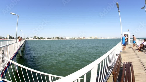 Slow Tilt To A Big Pontoon Over The Black Sea Shore, Summertime, Fish Eye