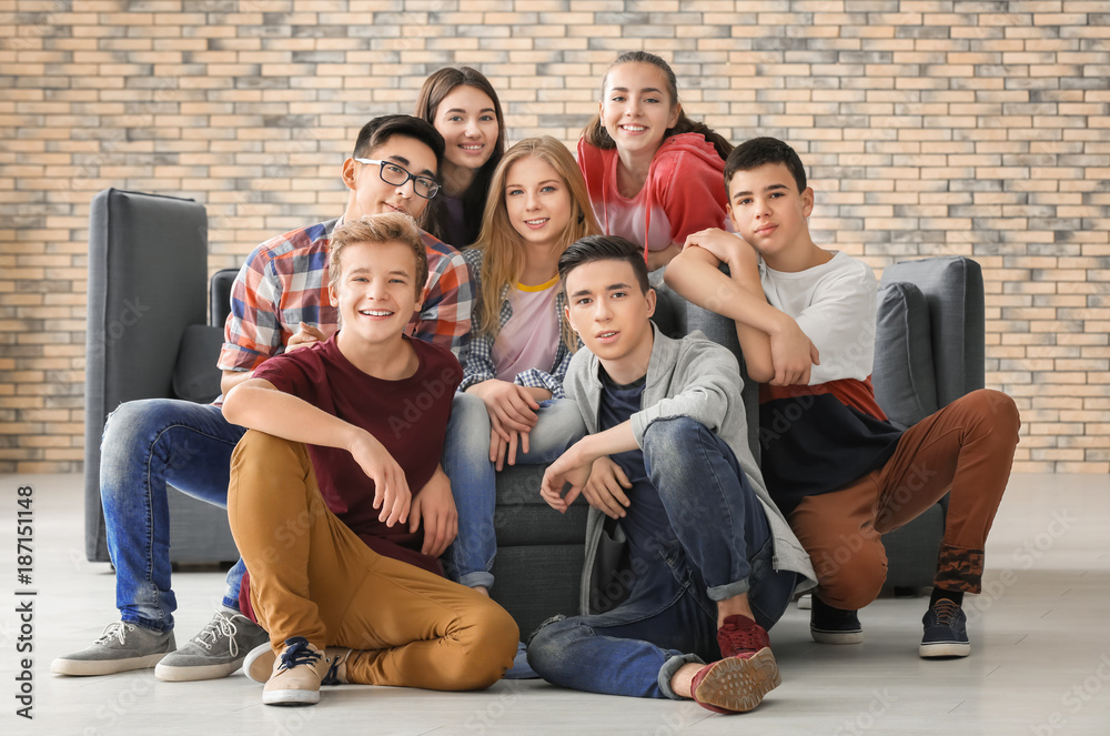 Group of funny teenagers indoors Group of funny teenagers indoors