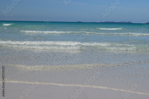 Beach background white sand and turquoise waters paradise