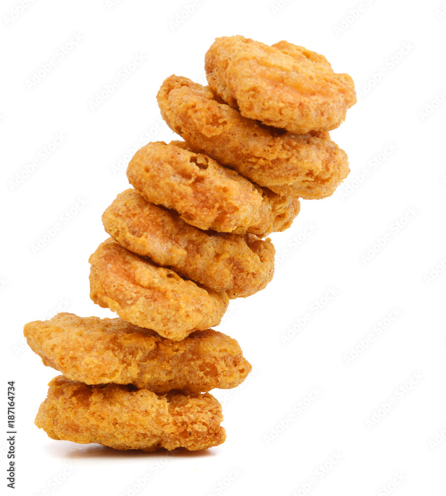 Macro of fried chicken nuggets on white background Macro of fried chicken nuggets on white background