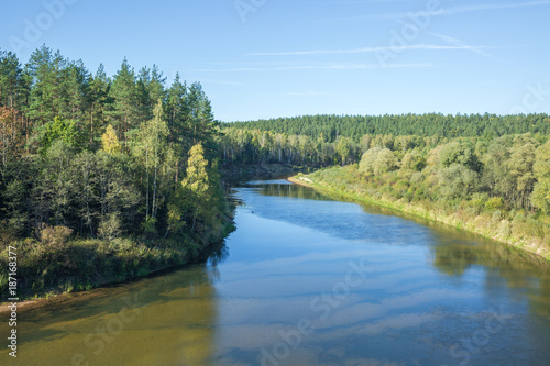 Red cliffs and river at city Cesis, country Latvia. photo