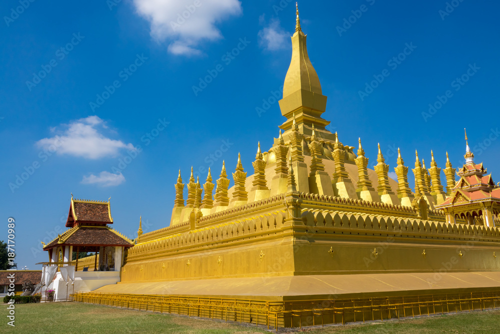 Naklejka premium Pha That Luang is a gold-covered large Buddhist stupa and be the most important national monument in Laos and a national symbol .Vientiane, Laos