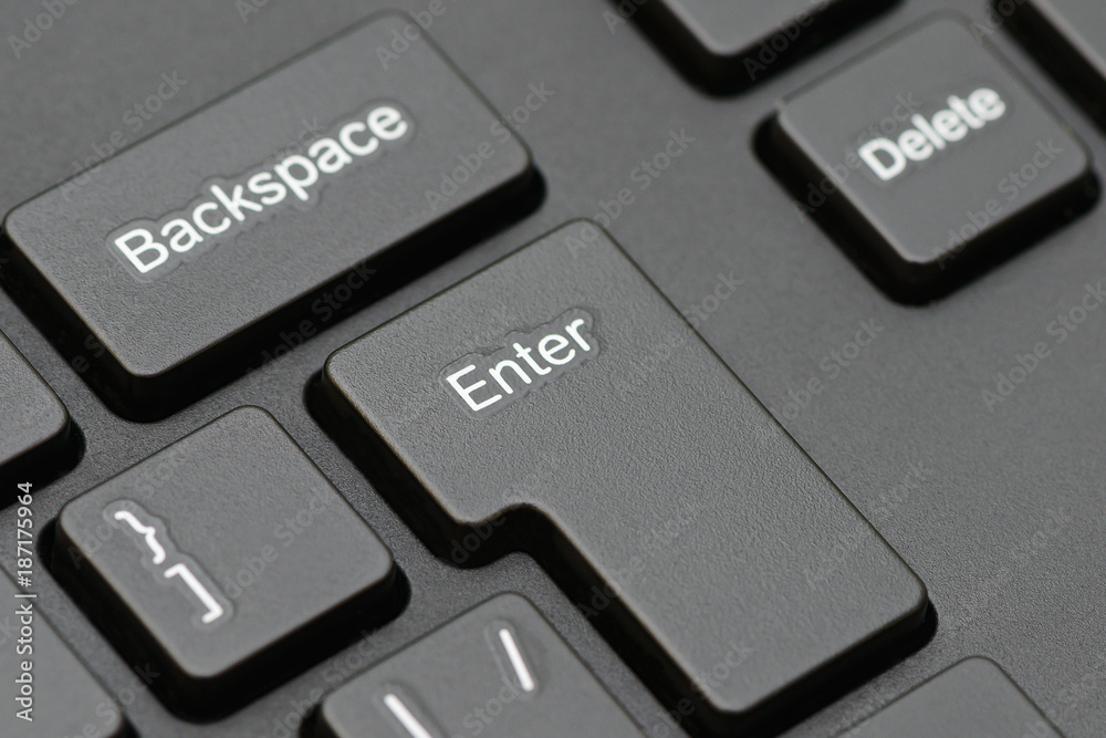 part of a computer keyboard with Enter and Backspace keys part of a computer keyboard with Enter and Backspace keys