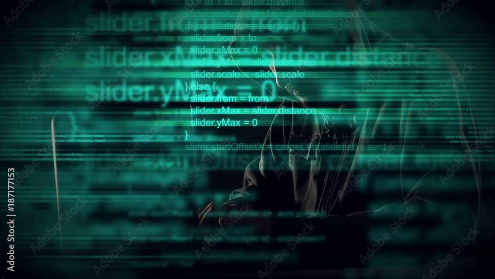 Cybersecurity, computer hacker with hoodie working on laptop ...