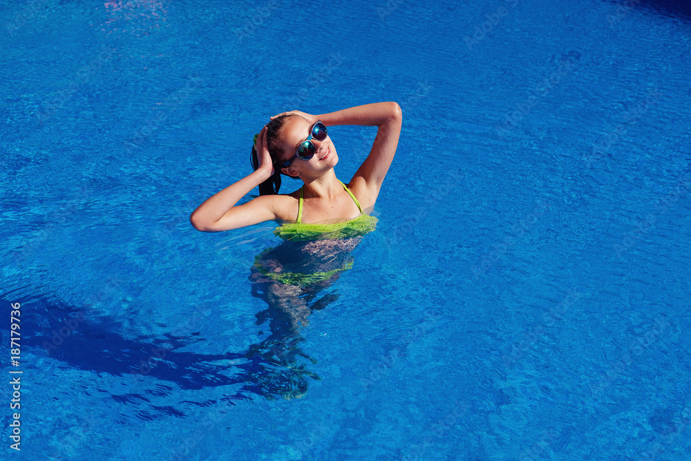 Teen Girl Relaxing Near Swimming Pool Stock Photo - Image of female, cute:  107215512