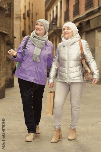 Elderly women walking around town