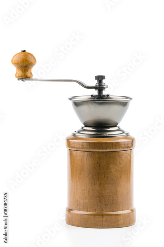 A vintage retro coffee grinder in a wooden case with handle isolated on white background (Old-fashioned).