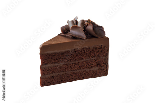 Triangle shape slices piece of dark chocolate fudge cake topping with chocolate curl on white isolated background with clipping paths. Homemade bakery concept for birthday cake.