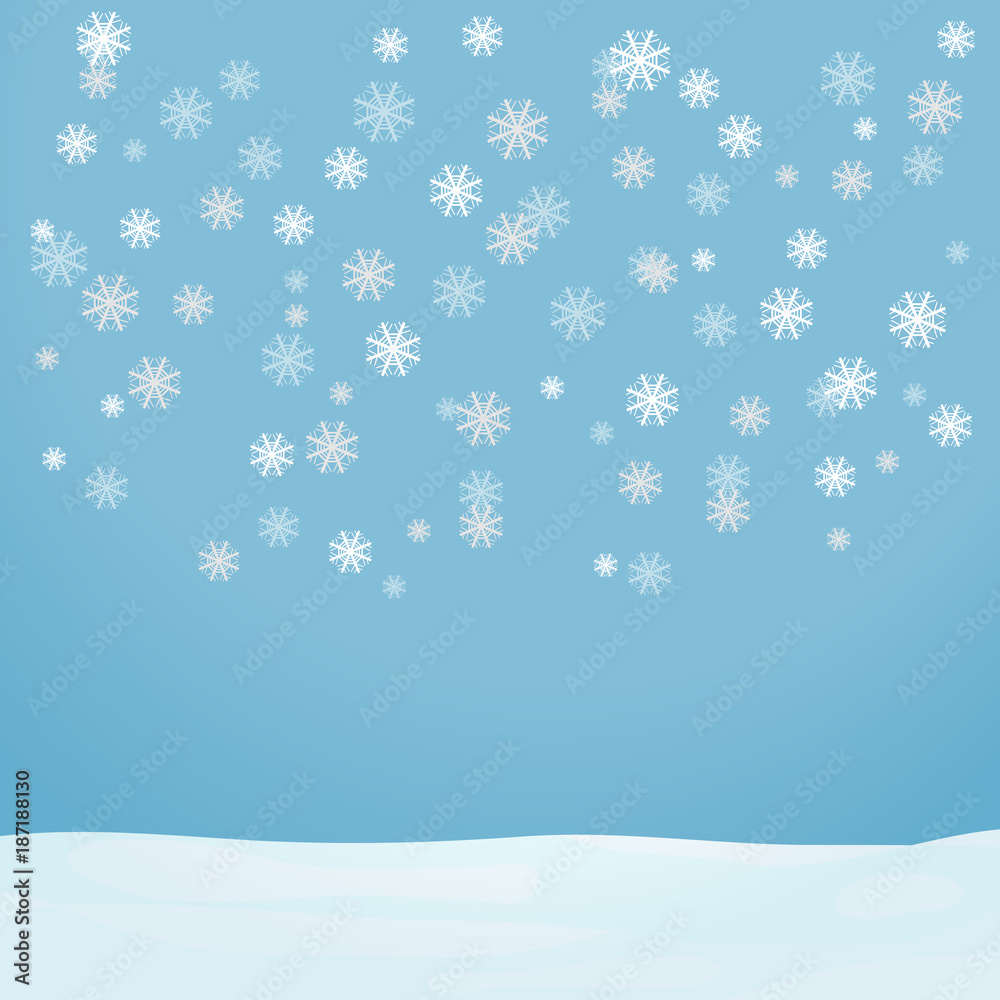 Snowflakes fall on a light blue background. Flying snowflakes fall on the snow.