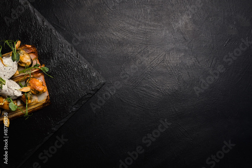 restaurant gourmet food on dark background. free space concept. delicious delicacy photo