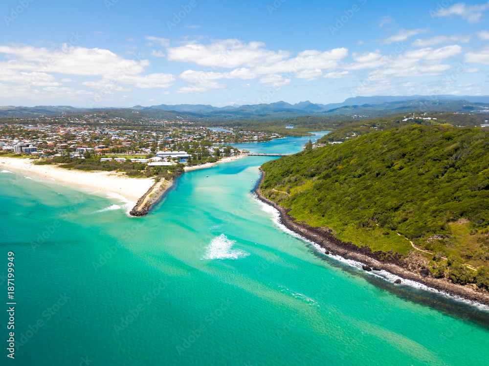 Tallebudgera creek and Burleigh Heads on the Gold Coast from an aerial perspective on a clear blue water day