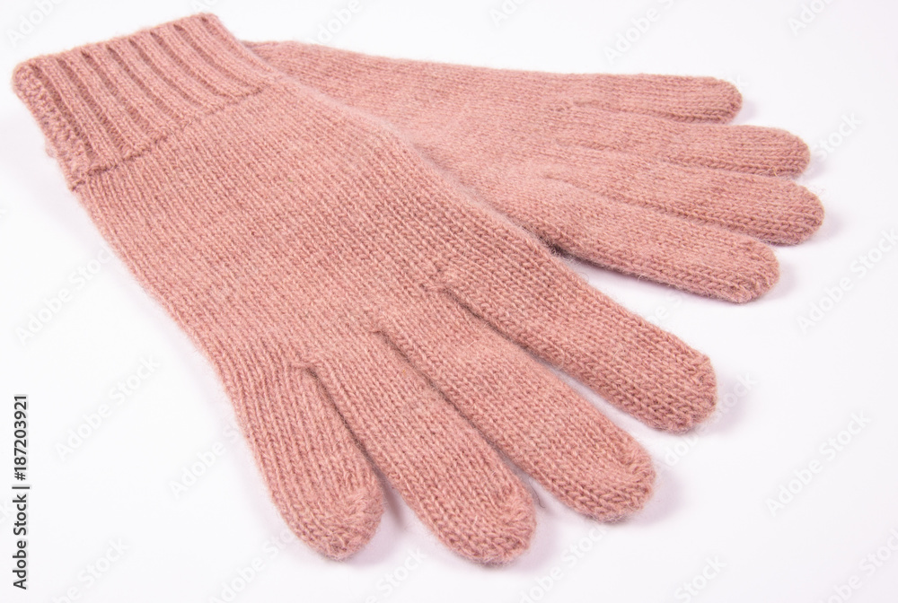 Winter, woolen gloves on a white background. Winter, woolen gloves on a white background.