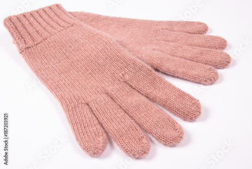 Winter, woolen gloves on a white background.