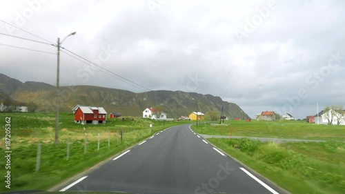 View from windscreen. Driving a car on mountain road. Beautiful landscape of Norway.