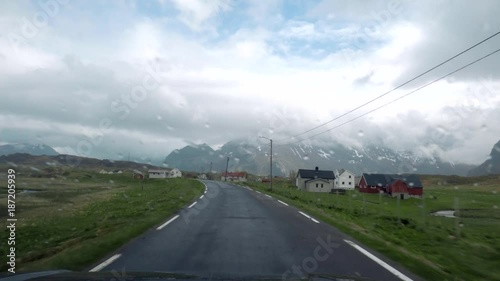 View from windscreen. Driving a car on mountain road. Beautiful landscape of Norway.