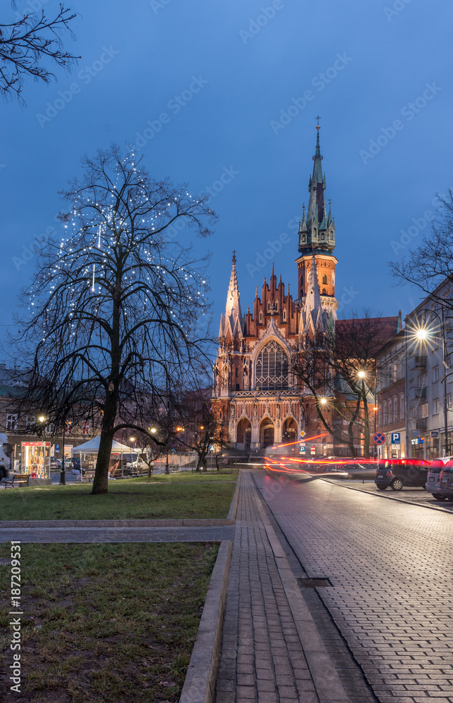 Fototapeta premium St Joseph church in Krakow, Poland, Podgorze district market square