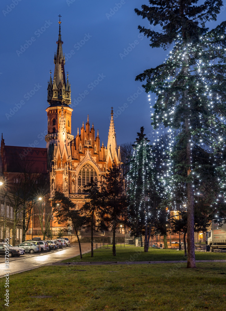 Fototapeta premium St Joseph church in Krakow, Poland, Podgorze district main market square