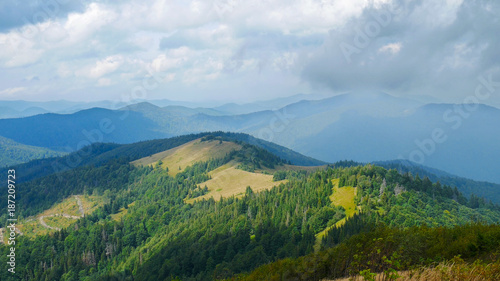View on Carpathians mountains valley in cloudy summer day