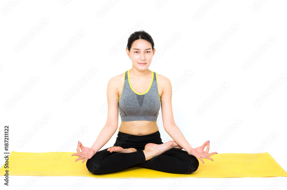 beautiful young woman doing yoga in meditation or half lotus poses on white background. beautiful young woman doing yoga in meditation or half lotus poses on white background.