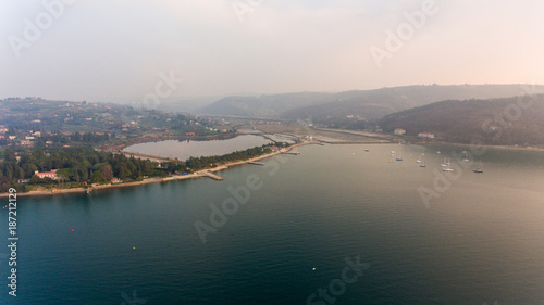 Aerial view of cliffs raising above sea. © anzebizjan