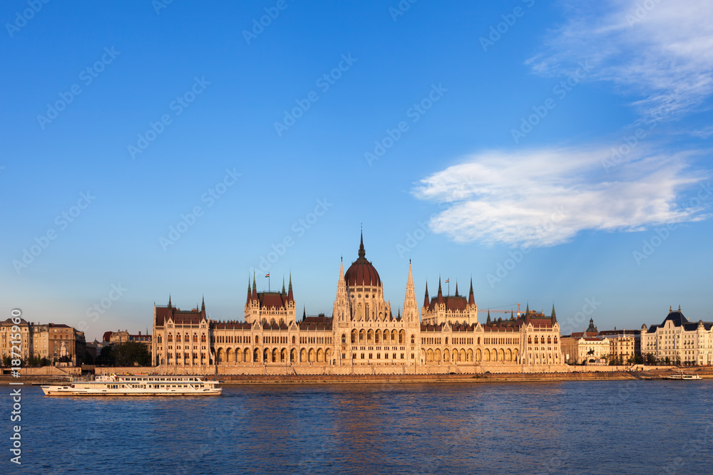 Hungarian Parliament by Danube River at Sunset in Budapest