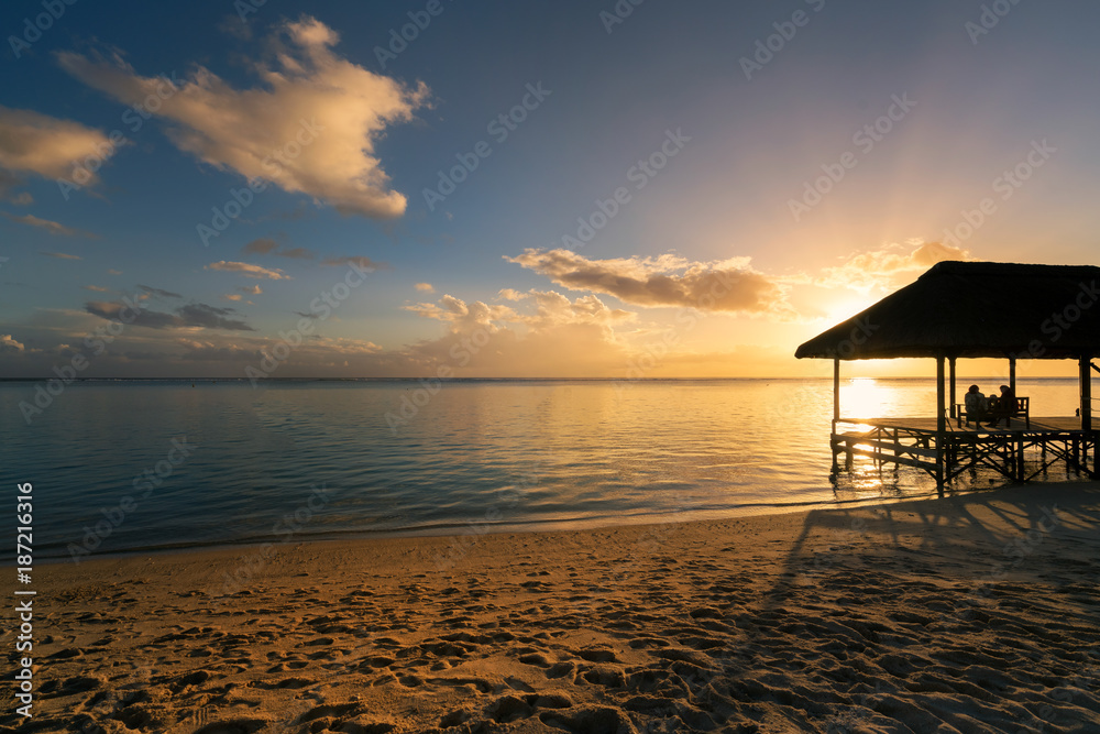 Relaxing on remote Paradise beach at sunset , Relaxing on remote Paradise beach at sunset ,