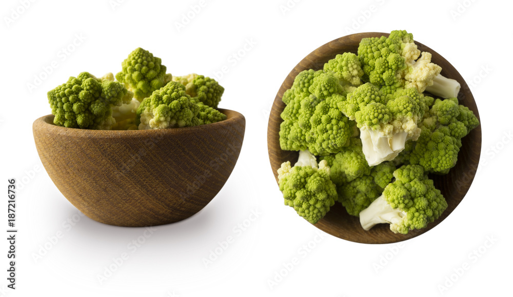 Roman cauliflower in wooden bowl isolated on white background. Roman cauliflower close up. Fractal texture of romanesco broccoli. Roman cauliflower with copy space for text. Roman cauliflower in wooden bowl isolated on white background. Roman cauliflower close up. Fractal texture of romanesco broccoli. Roman cauliflower with copy space for text.