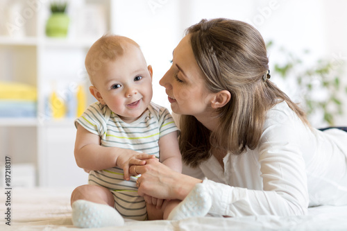 Young mother with her baby ...