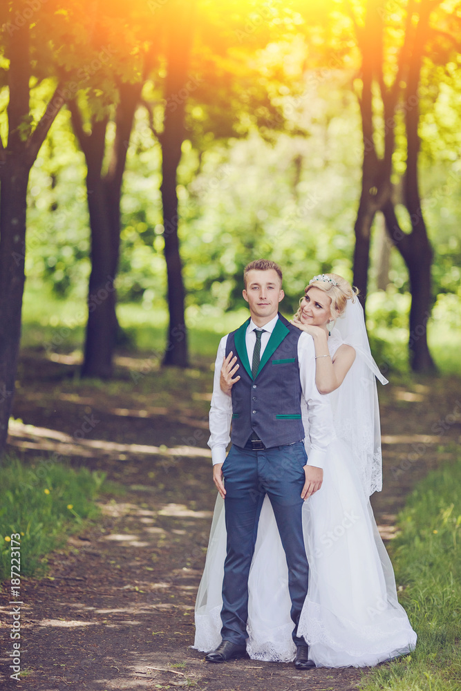 Young wedding couple enjoying romantic moments Young wedding couple enjoying romantic moments