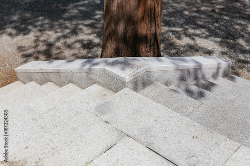 Detail of concrete stair of the Hokkaido Shrine (Hokkaido Jingu) with tree shadow in winter in Sapporo. Hokkaido, Japan. photo
