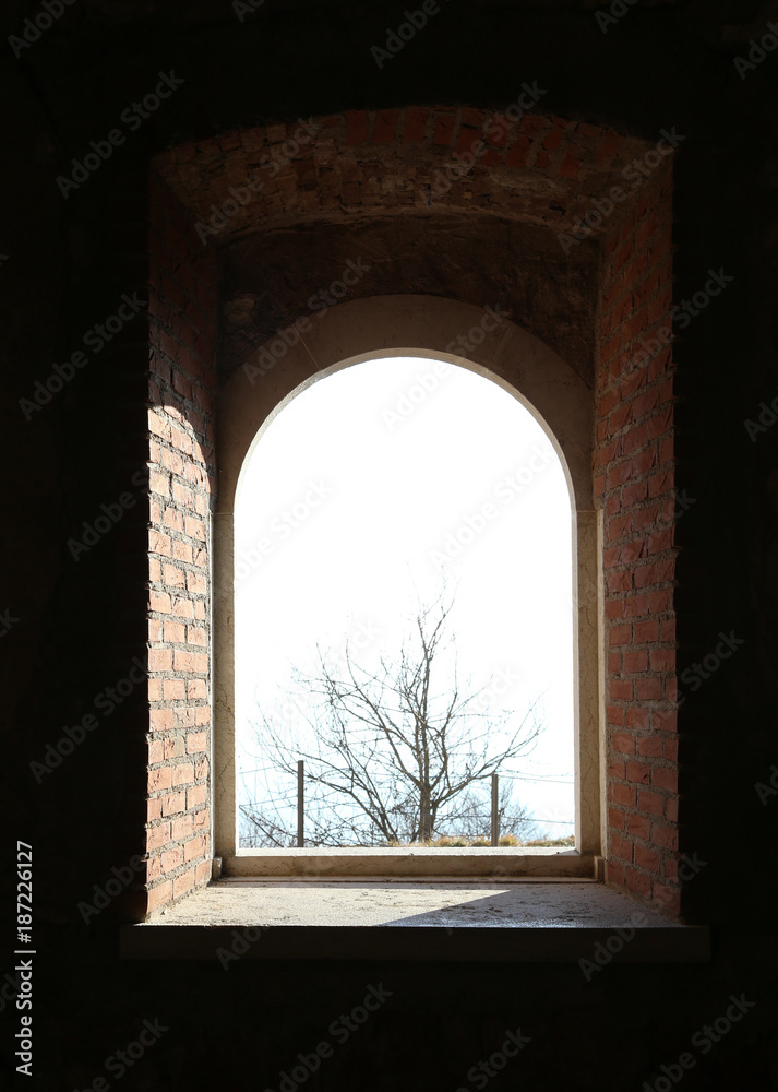 bright window of a ancient fortress