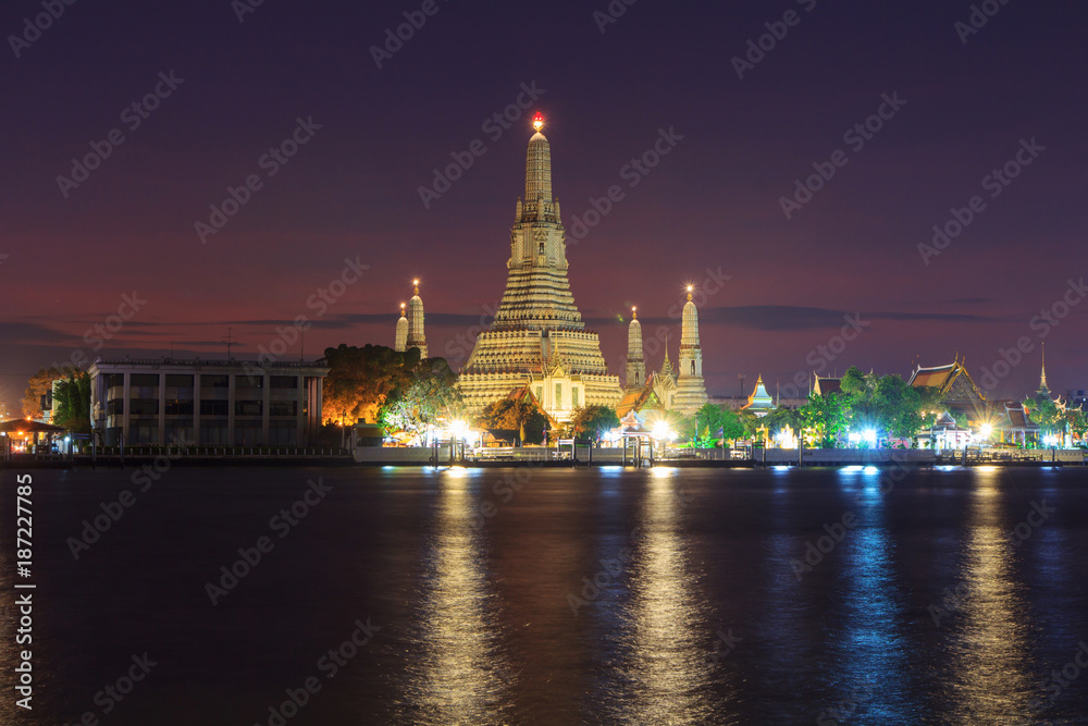 Big pagoda in Wat Arun Ratchawararam Ratchawaramahawihan / Wat Arun Landmark of Thailand in Sunset time