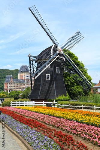 Colorful flower garden with windmill