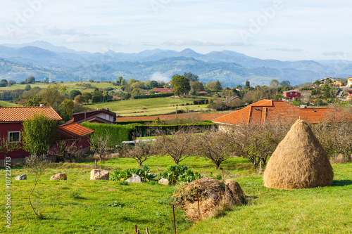 Pastoral landscape of Escamplero village with a haystake in the foreground. Asturias  Spain