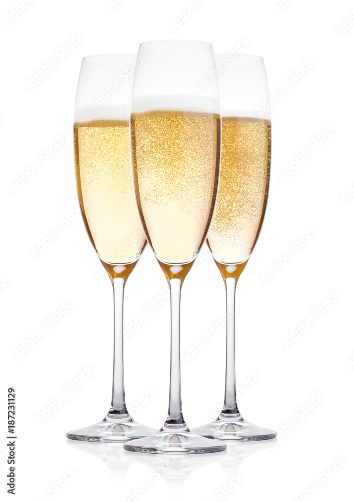 Elegant glasses of yellow champagne with bubbles