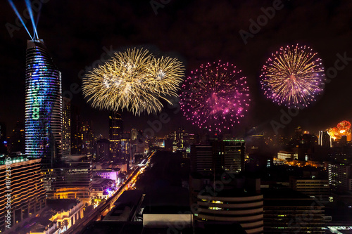 Colorful Firework New Years Celebration in Cityscape of Bangkok Thailand