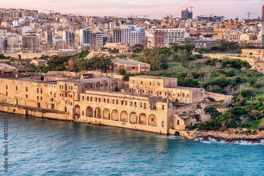 Malta: Manoel Island, Il-Gzira, Sliema and Marsans Harbour. Aerial view from city walls of Valletta at sunset