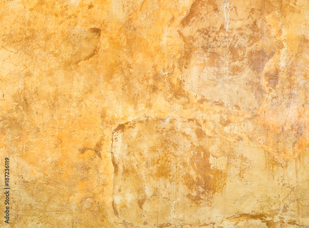 Close up grungy orange cement wall texture background