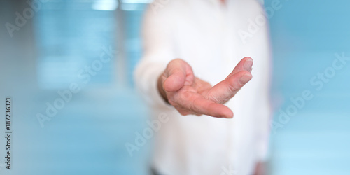 Doctor with outstretched hand to receive something photo