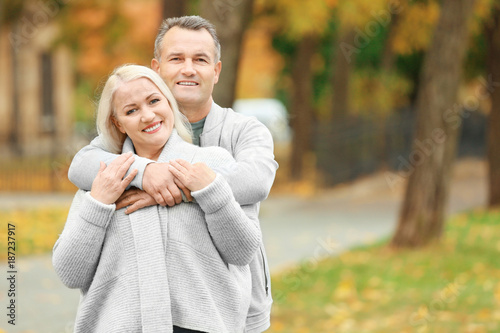 Happy mature couple hugging...