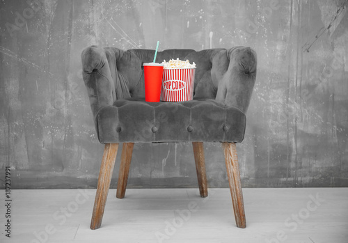 Grey armchair with popcorn ...