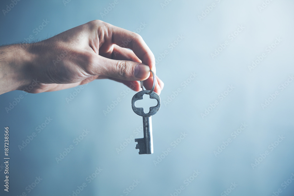 man hand old key