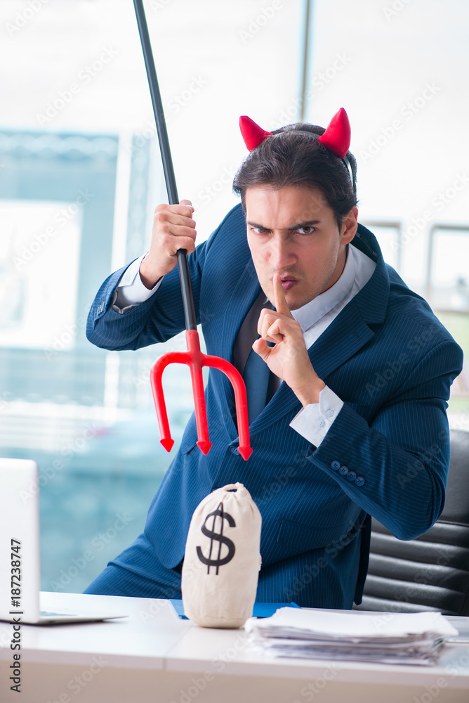 Fotografie Devil angry businessman in the office